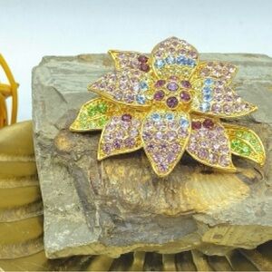 Elegant Gold Floral Brooch with Multicolor Crystals